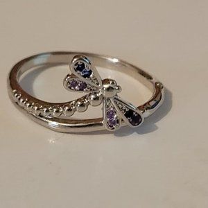 Lot of 7 Fragrant Jewels rings, size 8